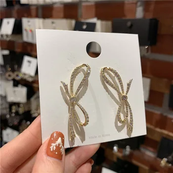 Xinbada 14k de oro de la joyería Micro incrustaciones de circón cristal arco de lujo aretes para mujer fiesta de la alta calidad de los aretes